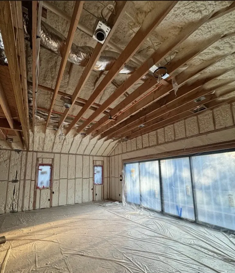 Interior walls and ceiling insulated with spray foam during new construction in Colby