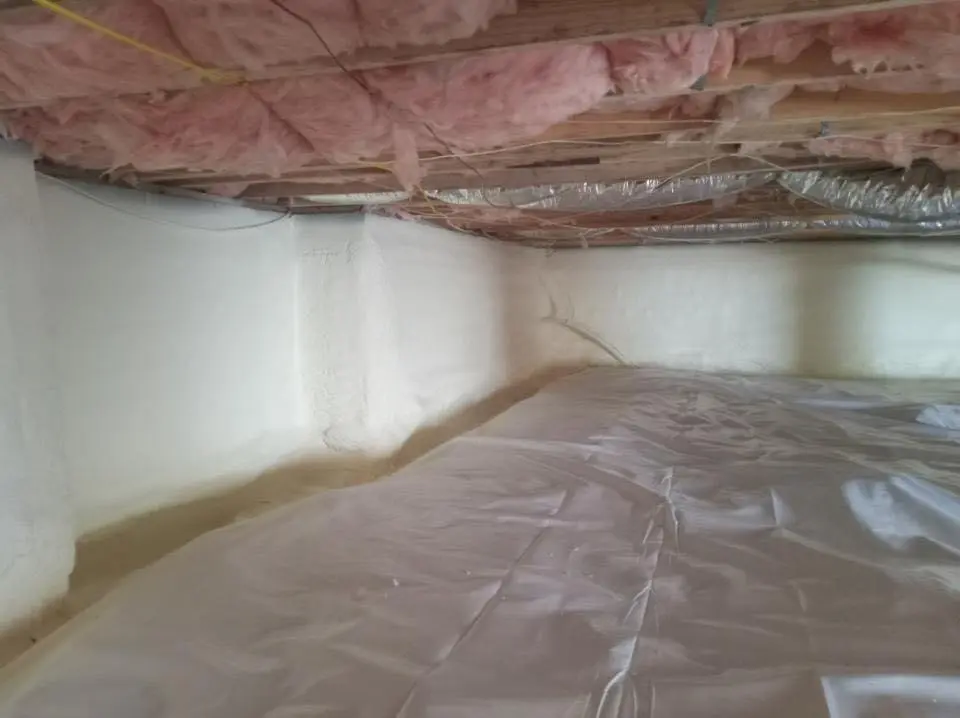 Crawl space encapsulation with closed-cell spray foam for Spray Foam Roofing in Colby